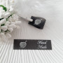 Silicone sew-on tags with an inscription «Hand Made» SLpr_004