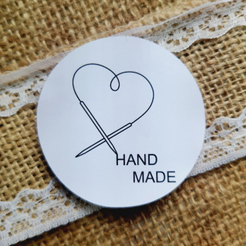 Stickers «Hand Made» with a picture of needles and thread in the shape of a heart. NKRN_00009
