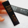 Black silicone tags for printing composition/care (on screw and sewn) 2cm