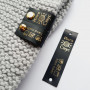 Black silicone tags for printing composition/care (on screw and sewn) 2cm
