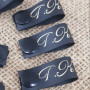 Black silicone tags with a button 1.5 cm